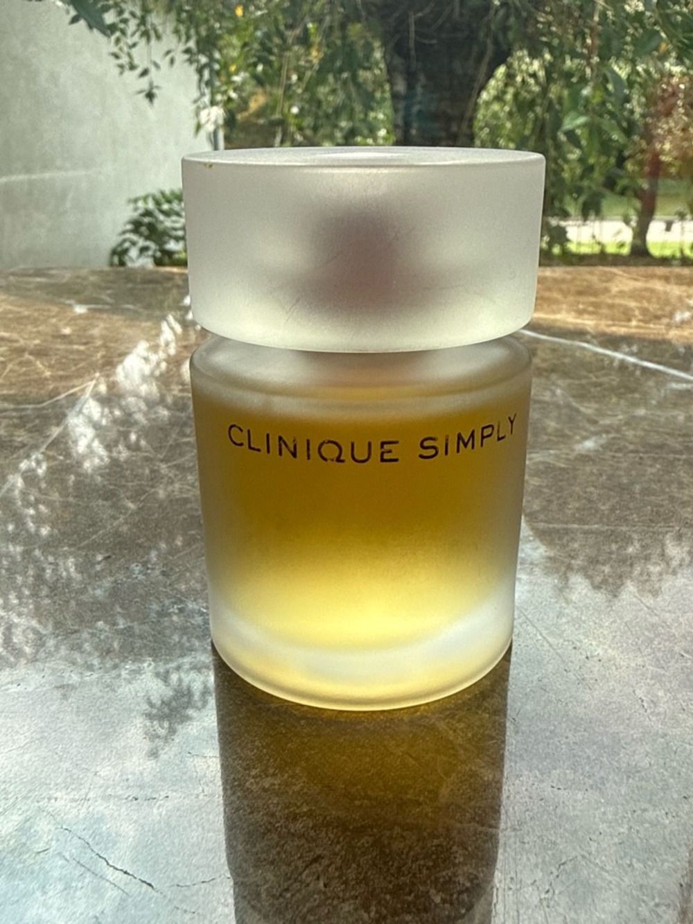 Clinique Simply Facial Oil — Frosted White Cap with Golden Oil